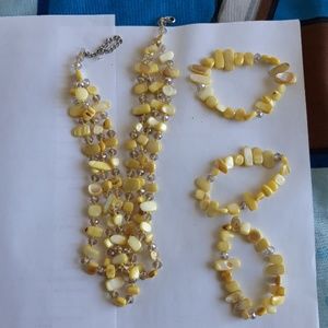 3 strand necklace with bracelets.